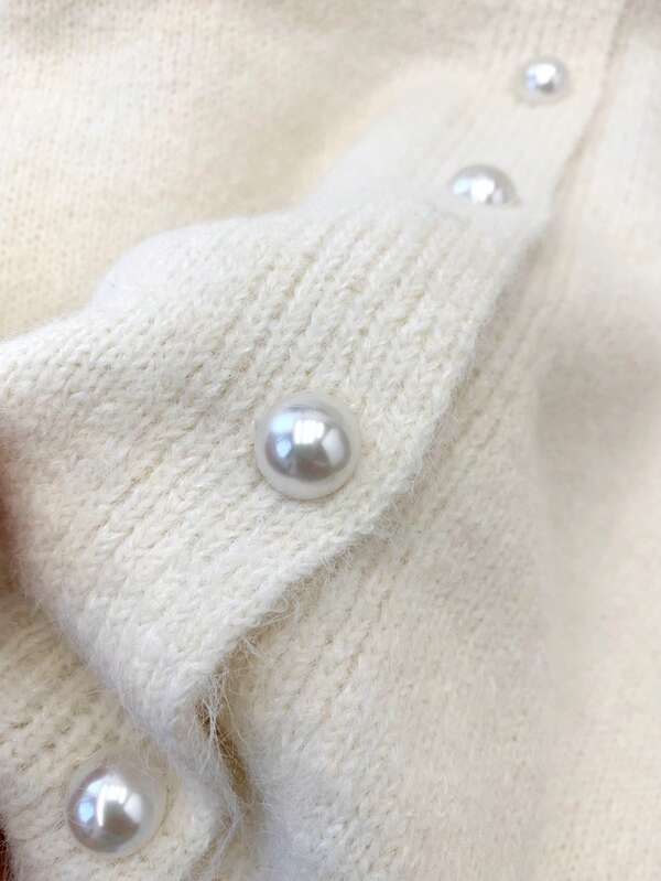 Cardigan blanc à manches longues avec bordure en dentelle